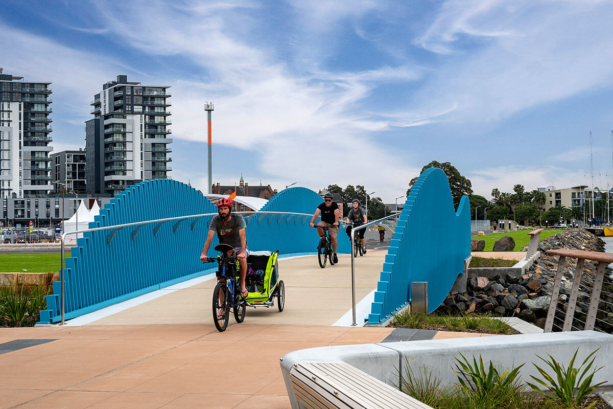 People cycling along Honeysuckle Promenade. Credit: Hunter and Central Coast Development Corporation